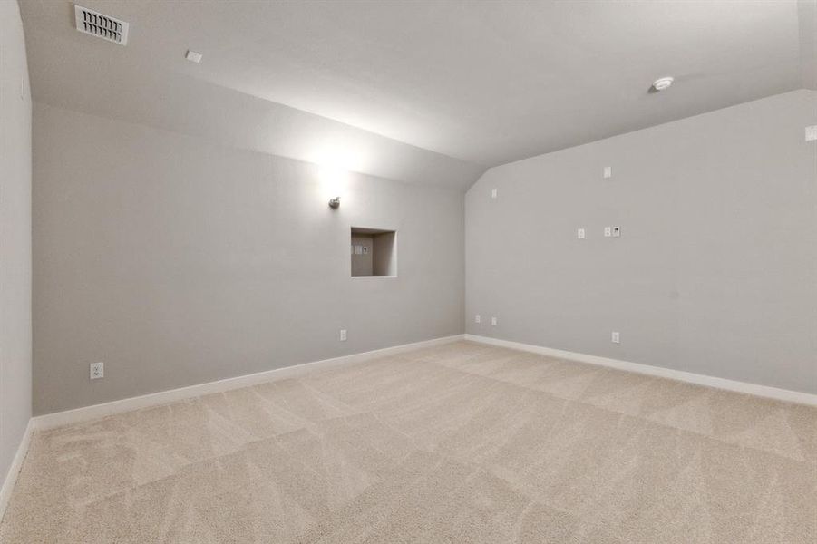 Media room in the Masters home plan by Trophy Signature Homes – REPRESENTATIVE PHOTO Media room in the Masters home plan by Trophy Signature Homes – REPRESENTATIVE PHOTO