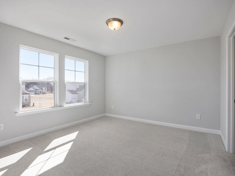 Spacious, unfurnished interior of a new home in Tobacco Road, Angier (Image 41).