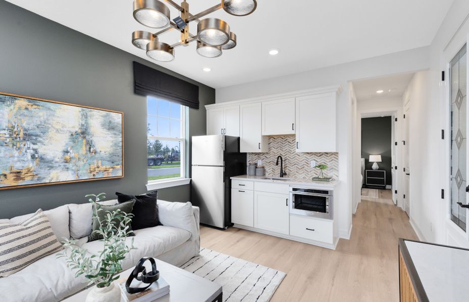 Representative furnished interior of a home built from the Serena by Pulte Homes in The Grow, Orlando (Image 13).