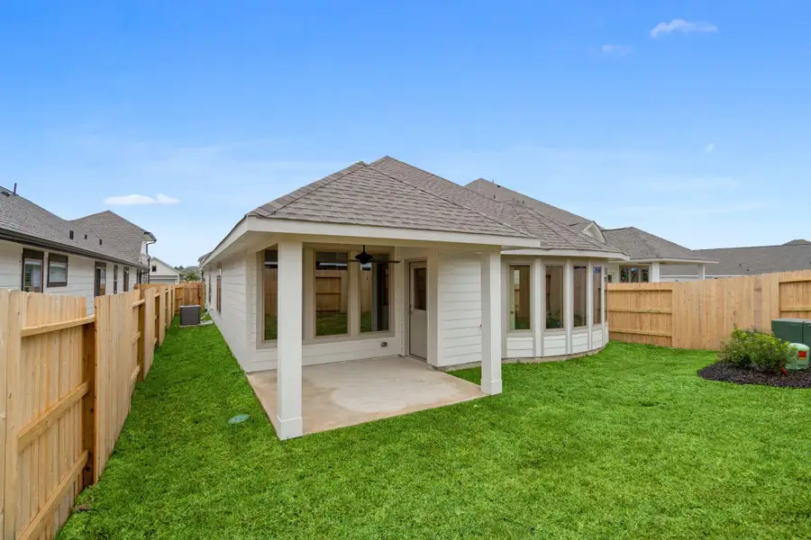 Exterior details and patio area of a home in , Spring (Image 3). Exterior details and patio area of a home in , Spring (Image 3).