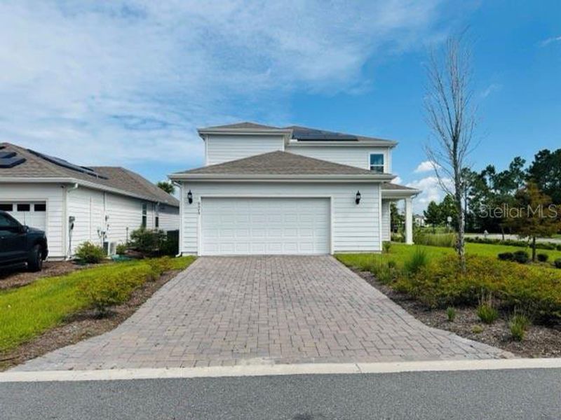 Front exterior of a new home in , St. Cloud, FL, highlighting curb appeal (Image 19).