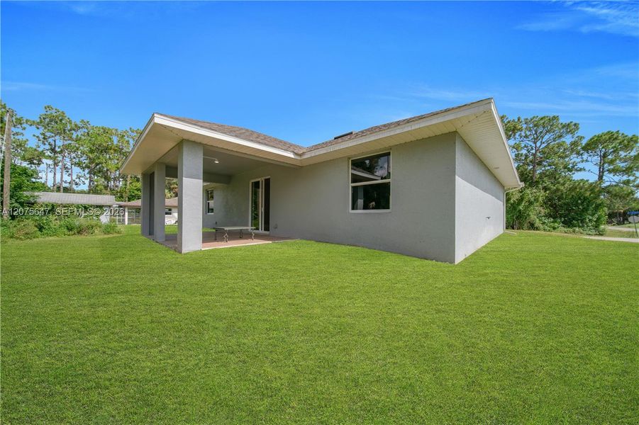 Exterior details and patio area of a home in , Lehigh Acres (Image 4).