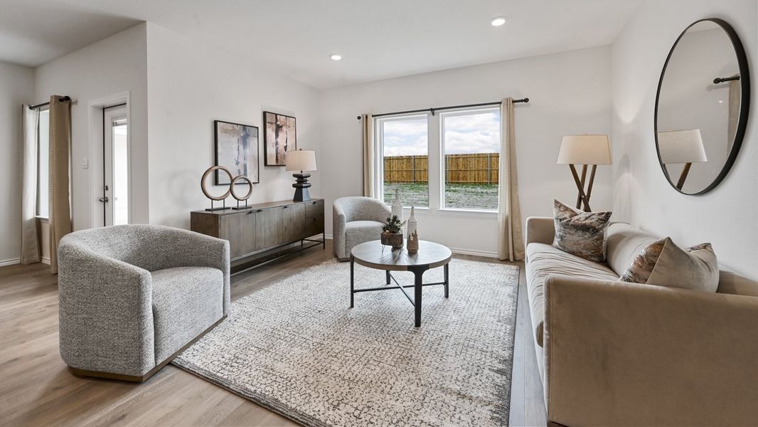 Representative furnished interior of a home built from the Midland by D.R. Horton in Whitewing Trails, Princeton (Image 10).