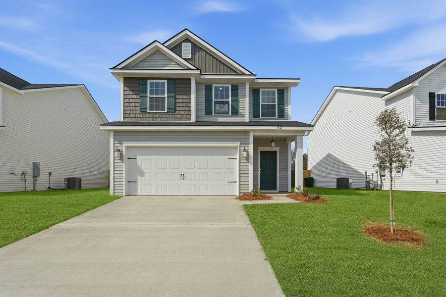 Representative exterior photo of a completed home built from the The Stacy by RTS Homes in Lakeside at Fifteen West, Hinesville, GA (Image 19).