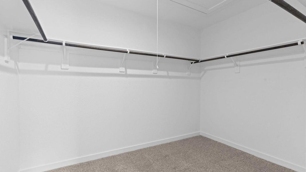 Spacious, unfurnished interior of a new home in Caldwell Crossing, Iowa Colony (Image 13).