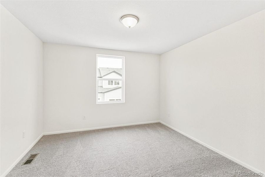 Spacious, unfurnished interior of a new home in Sky Ranch Villas, Watkins (Image 33).