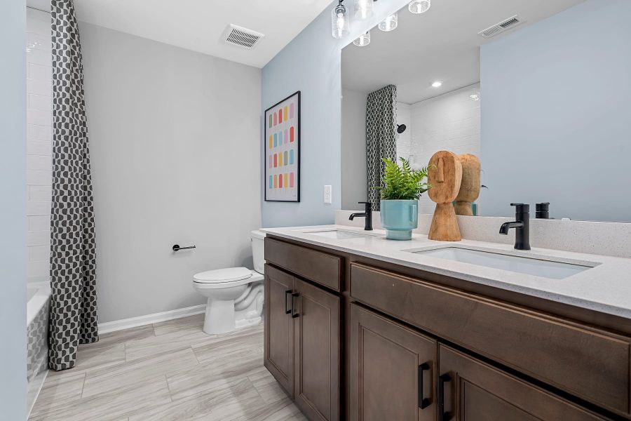 Representative furnished interior of a home built from the Woodwright by Tri Pointe Homes in Alton Creek, Mint Hill (Image 39).