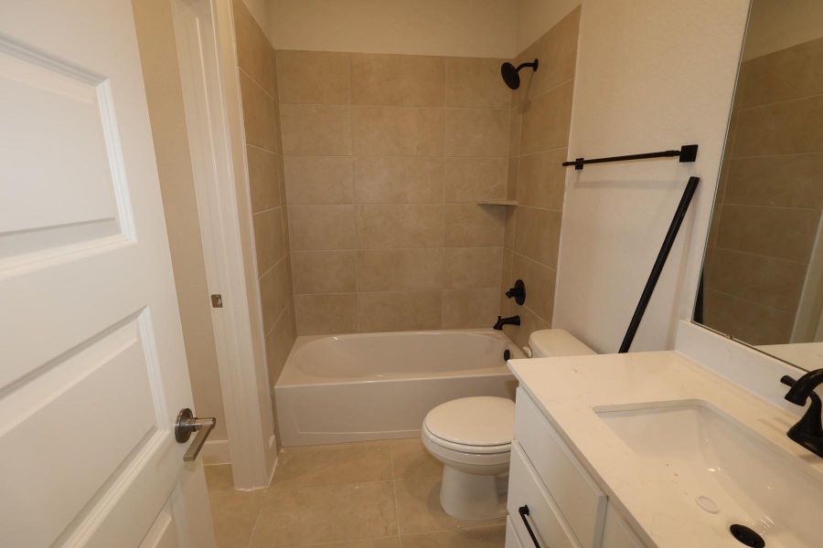 Furnished interior view inside a new home in Dunham Pointe, Cypress (Image 3).