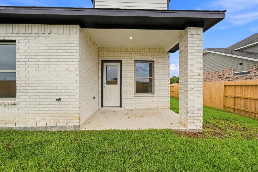 Exterior details and patio area of a home in Windcress, Cove (Image 22).