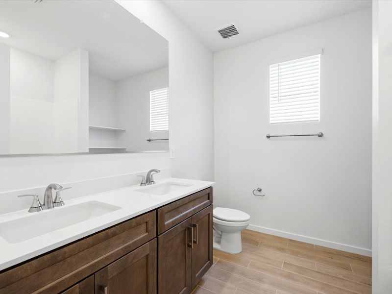 Furnished interior view inside a new home in Blossom Rock Reserve Series, Apache Junction (Image 9).