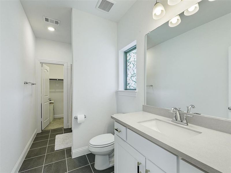 Bathroom with tub/shower combo
Walk-in Closet