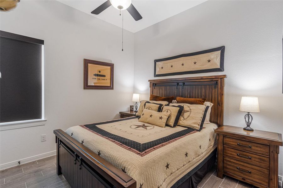 Cozy bedroom featuring plenty of room for you guest with a queen size bed.