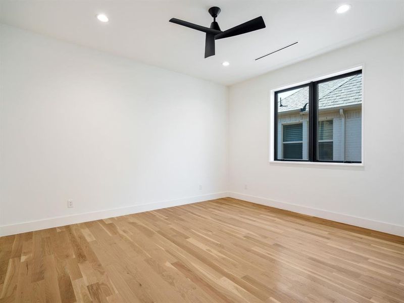 Spare room with light wood-style flooring, recessed lighting, and a ceiling fan