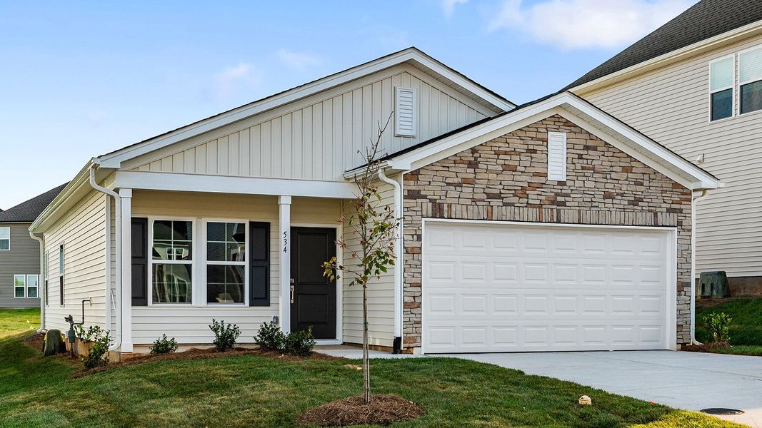Exterior details and patio area of a home in Hanes Lake, Winston-Salem (Image 3).