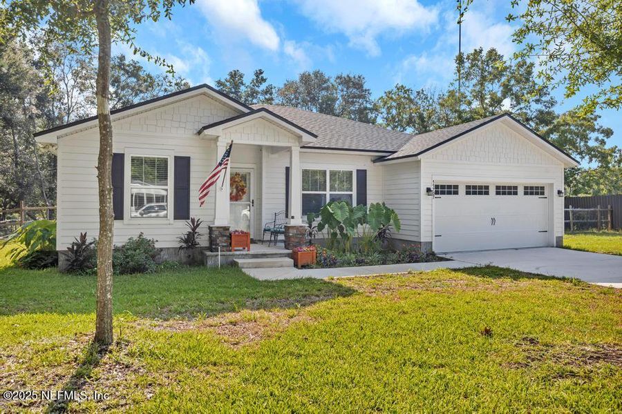 Front exterior of a new home in , Jacksonville, FL, highlighting curb appeal (Image 2).