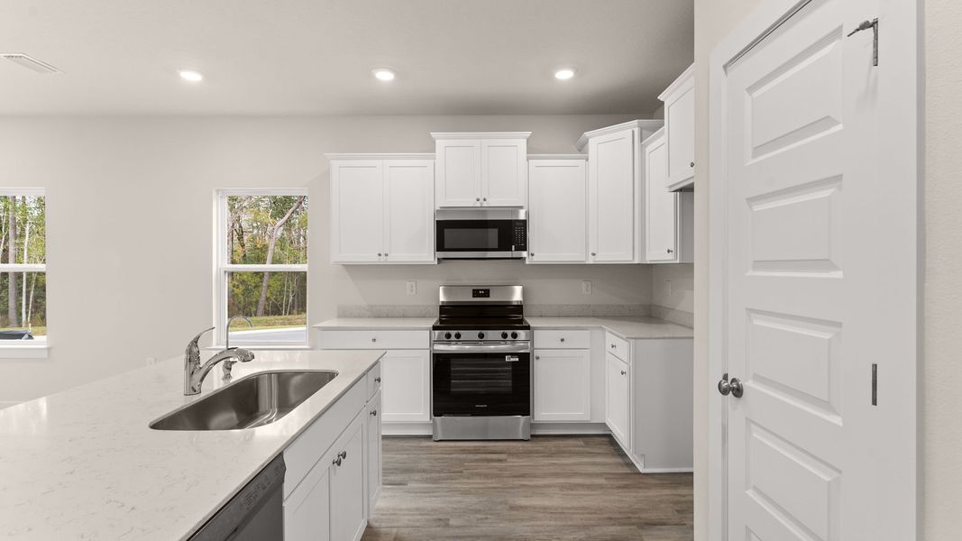 Representative furnished interior of a home built from the Palm Exterior by D.R. Horton in Genoa Landing Townhomes, Freeport (Image 5).