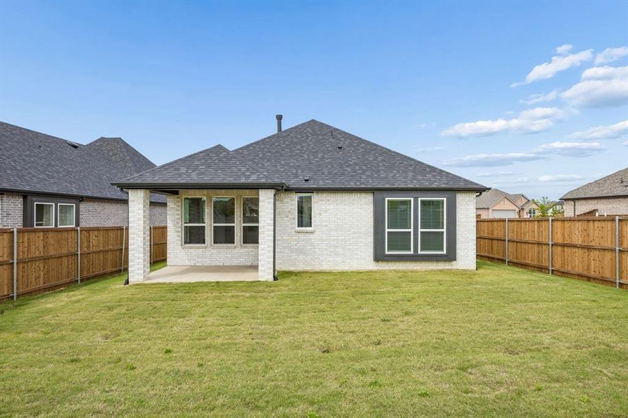 Exterior details and patio area of a home in , Aubrey (Image 21).