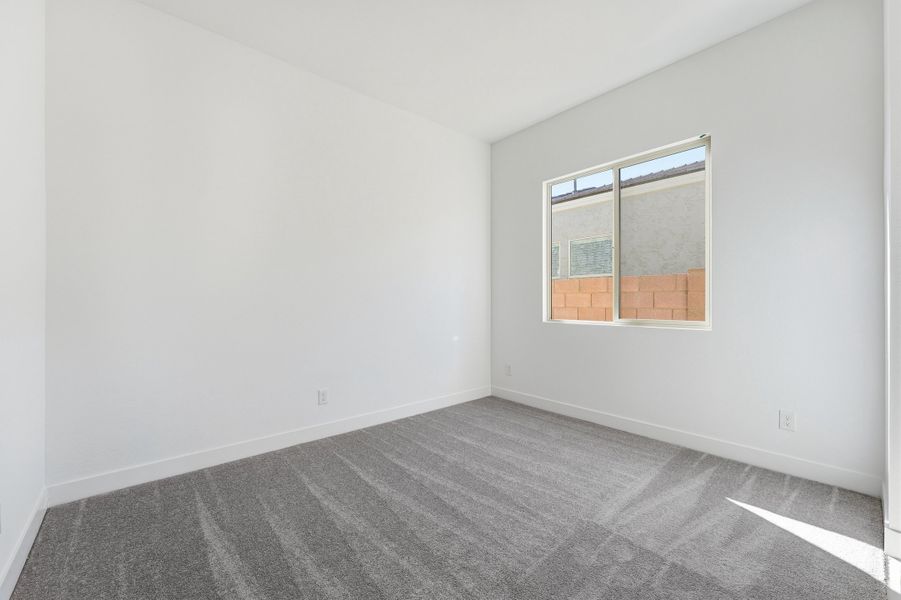 Spacious, unfurnished interior of a new home in Combs Ranch, San Tan Valley (Image 30).