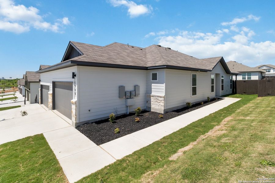 Front exterior of a new home in , San Antonio, TX, highlighting curb appeal (Image 25).