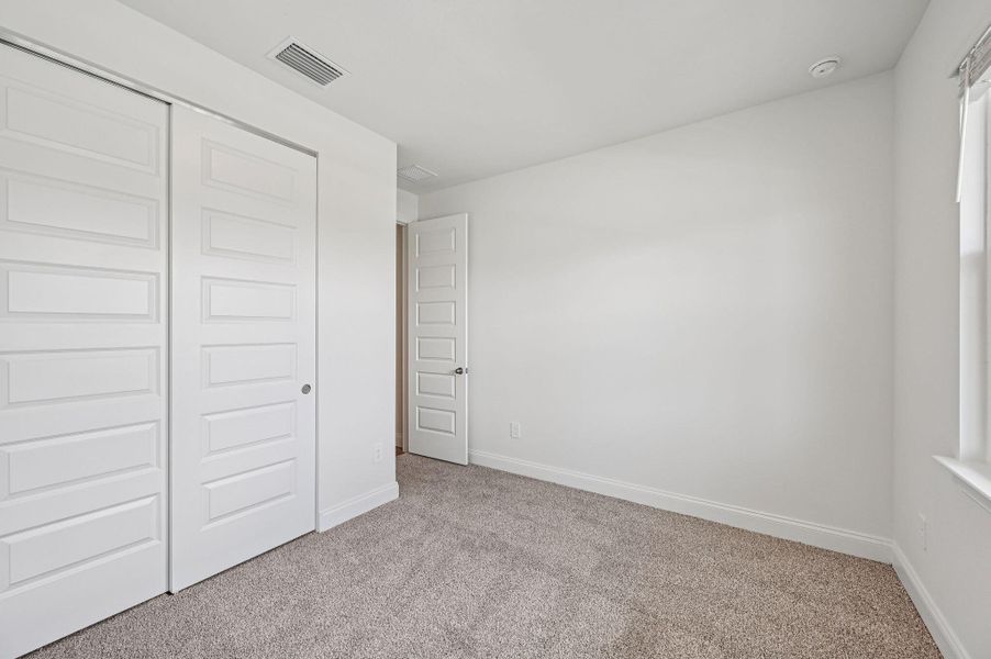 Spacious, unfurnished interior of a new home in Hampton Park - Signature Series, Vero Beach (Image 32). Spacious, unfurnished interior of a new home in Hampton Park - Signature Series, Vero Beach (Image 32).