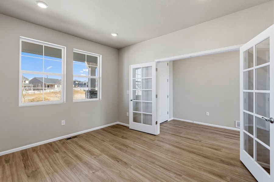 Spacious, unfurnished interior of a new home in The Estates Collection at Murphy Creek, Aurora (Image 17).