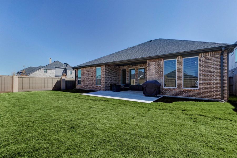 Exterior details and patio area of a home in Cross Creek West, Fulshear (Image 3).