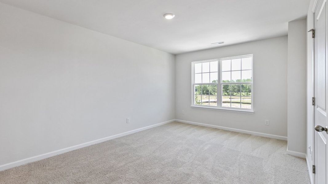 Spacious, unfurnished interior of a new home in The Townes at Wilson's Ridge, Smithfield (Image 21).
