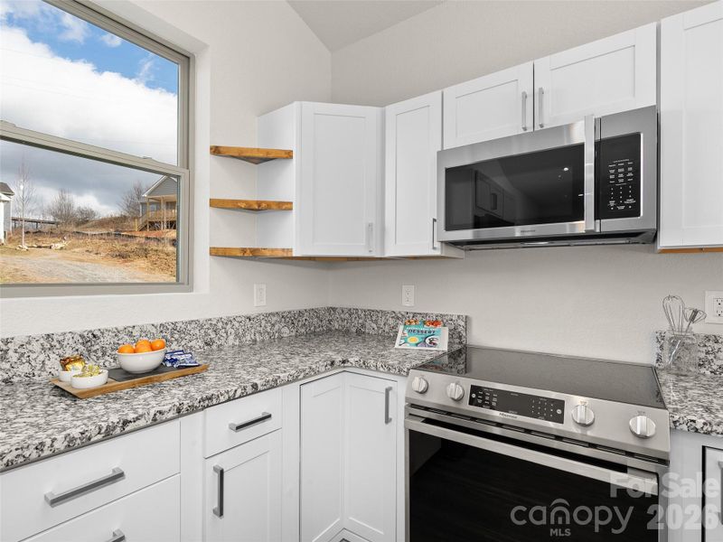 Furnished interior view inside a new home in , Waynesville (Image 6).