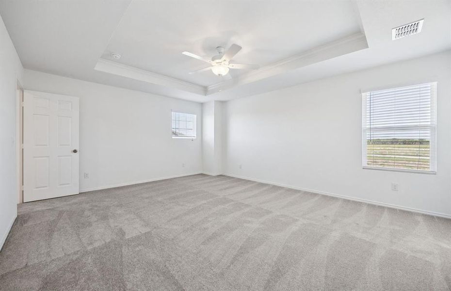 Spacious owner's suite with private bath