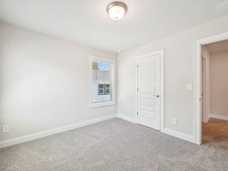 Secondary Bedroom in the Oleander floorplan at a Meritage Homes community in Atlanta, GA.