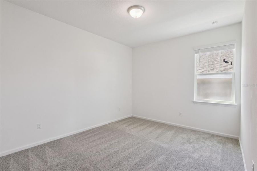 Spacious, unfurnished interior of a new home in Grand Isle, Grand Island (Image 19).