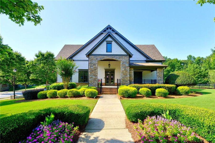 Front exterior of a new home in The Reserve At Liberty Park, Braselton, GA, highlighting curb appeal (Image 26). Front exterior of a new home in The Reserve At Liberty Park, Braselton, GA, highlighting curb appeal (Image 26).