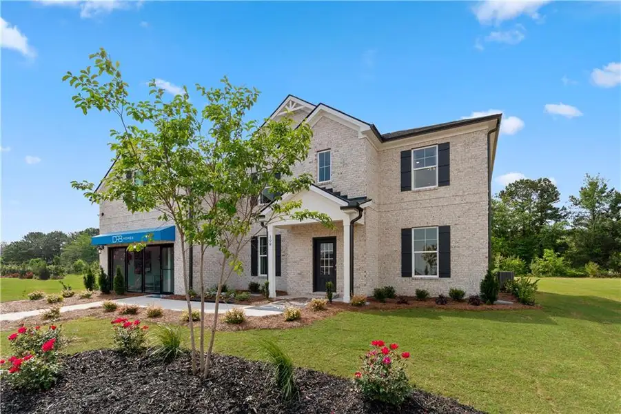 Front exterior of a new home in Westwind Estates, Hampton, GA, highlighting curb appeal (Image 24).
