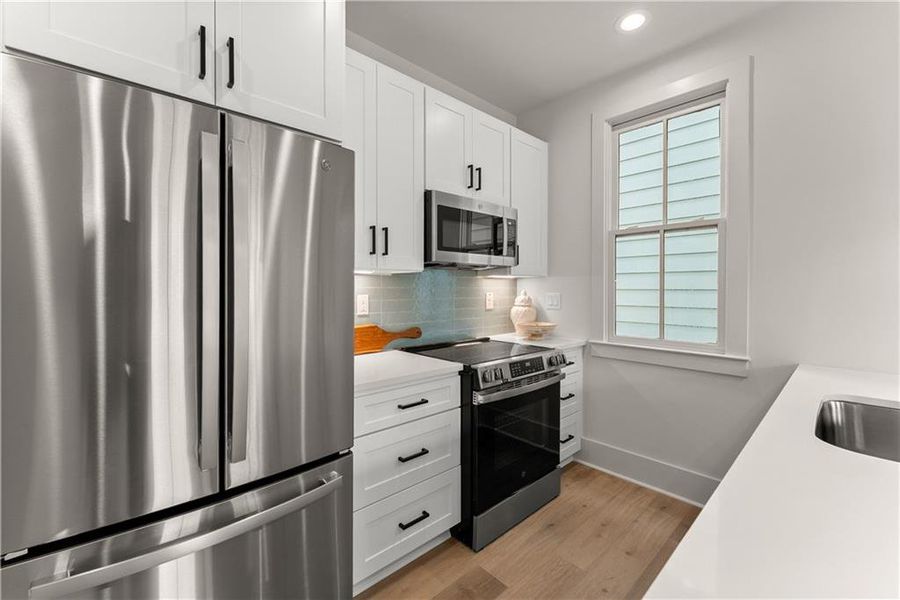 Furnished interior view inside a new home in , Gainesville (Image 12).