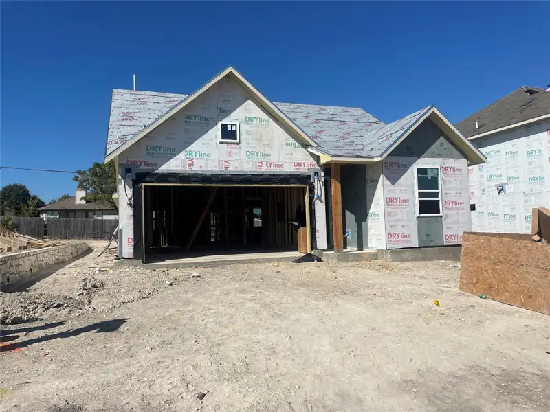 In-progress construction of a new home in Covered Bridge, Hutto, TX (Image 9).