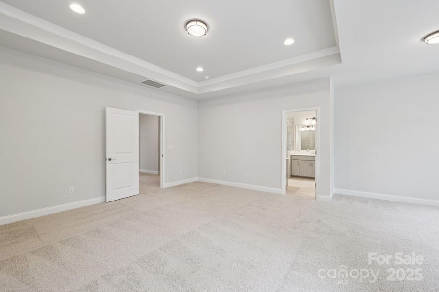 Spacious, unfurnished interior of a new home in Walk23, Huntersville (Image 24).