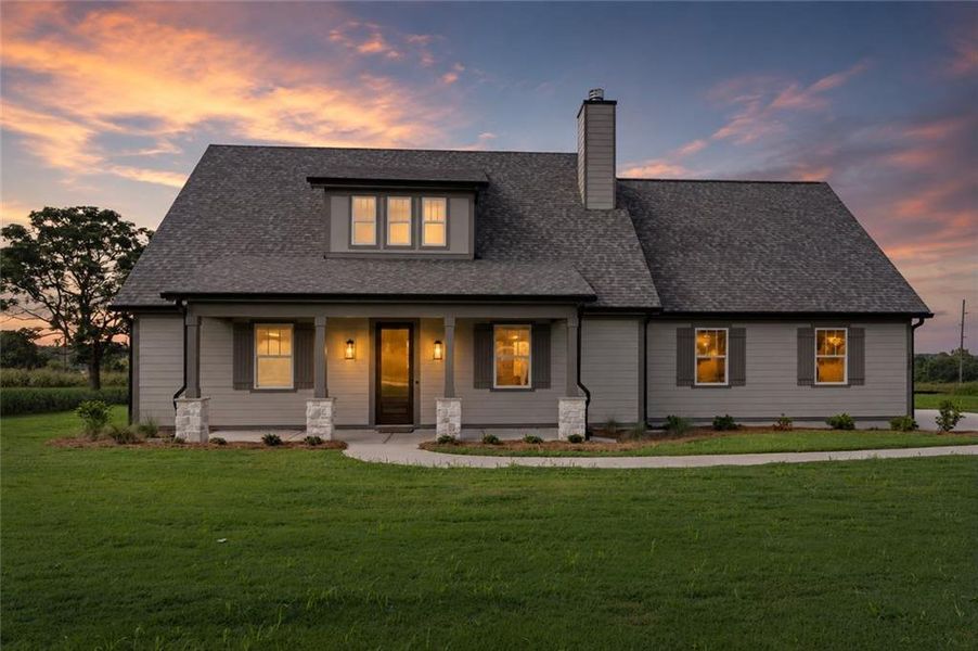 Front exterior of a new home in , Madison, GA, highlighting curb appeal (Image 28). Front exterior of a new home in , Madison, GA, highlighting curb appeal (Image 28).