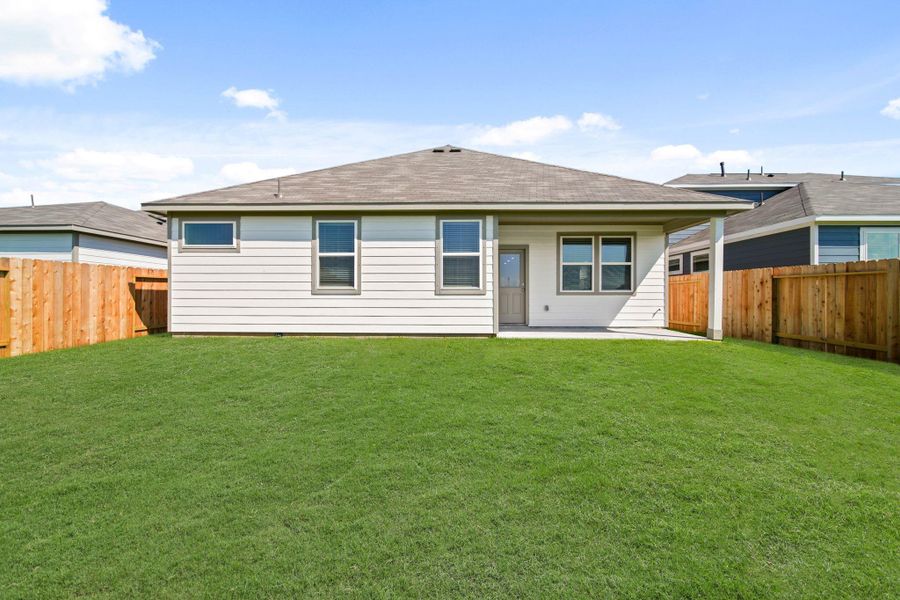 Exterior details and patio area of a home in Russell Ranch, Bay City (Image 2).