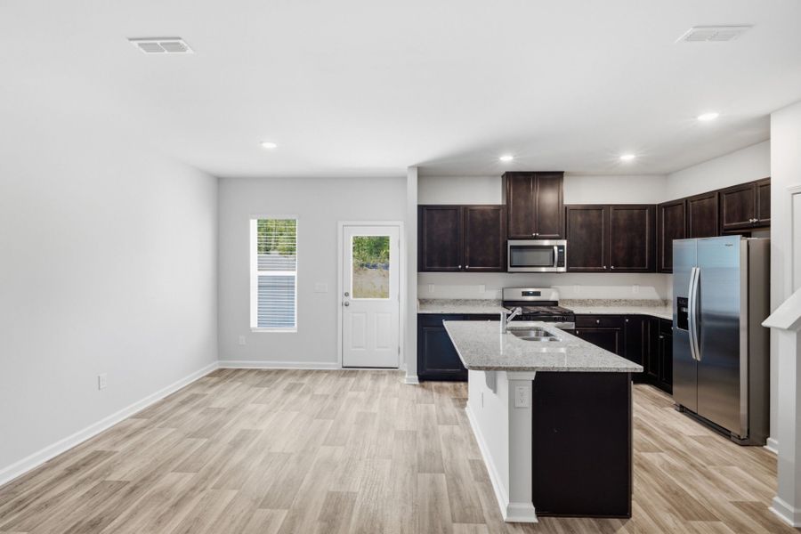 Furnished interior view inside a new home in Carpenter Falls, Durham (Image 21).