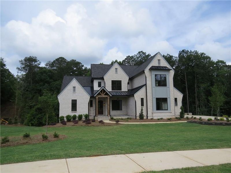 Front exterior of a new home in , Acworth, GA, highlighting curb appeal (Image 23).