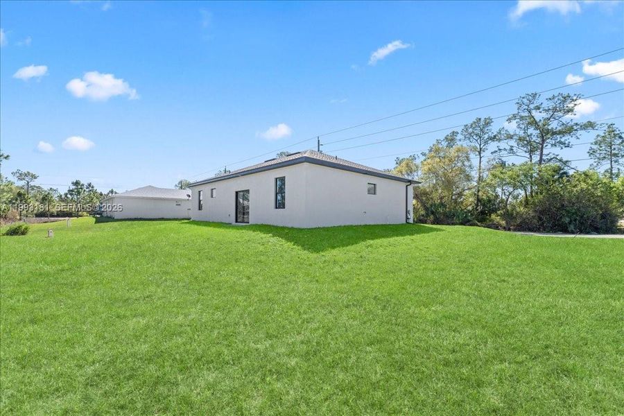 Exterior details and patio area of a home in , Lehigh Acres (Image 12).