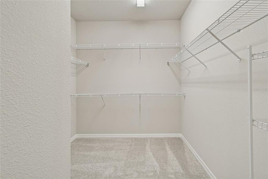 Spacious, unfurnished interior of a new home in Laureate Park at Lake Nona - Garden Series, Orlando (Image 26).