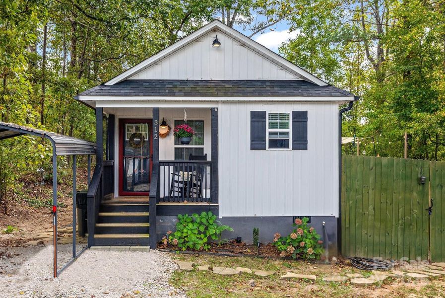 Front exterior of a new home in , Clover, SC, highlighting curb appeal (Image 1).