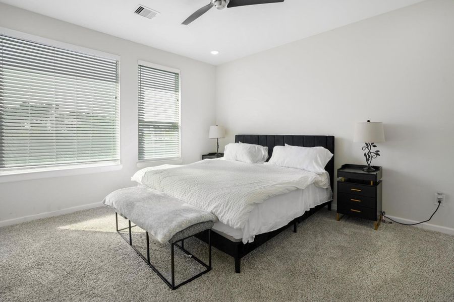 Another view of the primary bedroom.