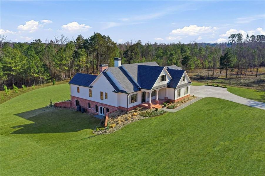 Front exterior of a new home in , White, GA, highlighting curb appeal (Image 36). Front exterior of a new home in , White, GA, highlighting curb appeal (Image 36).
