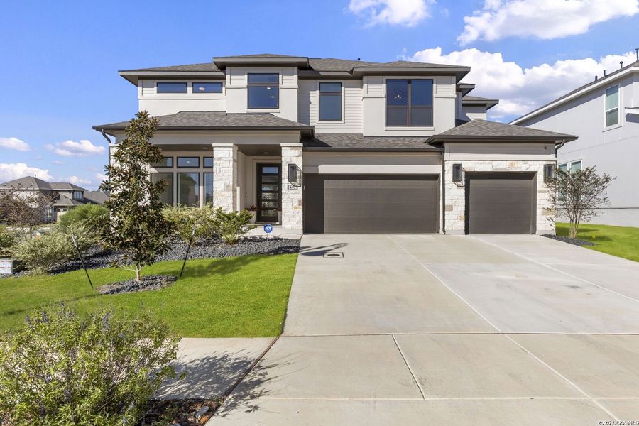 Front exterior of a new home in Esperanza, Boerne, TX, highlighting curb appeal (Image 30).