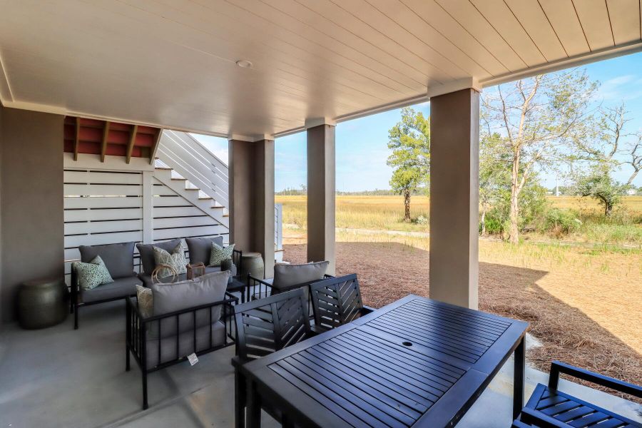 Exterior details and patio area of a home in The Preserve at Pennys Creek, Johns Island (Image 4).