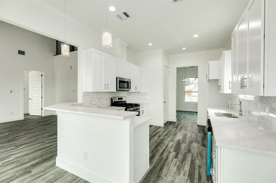 Traditional style kitchen opens to the living room