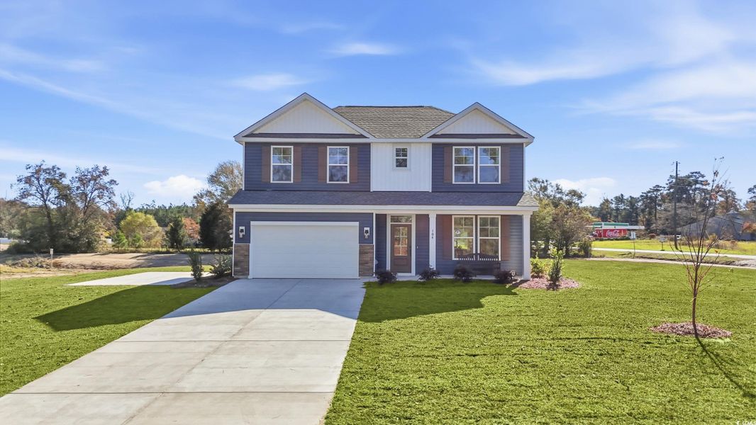 Front exterior of a new home in Westwood Reserve, Conway, SC, highlighting curb appeal (Image 1). Front exterior of a new home in Westwood Reserve, Conway, SC, highlighting curb appeal (Image 1).