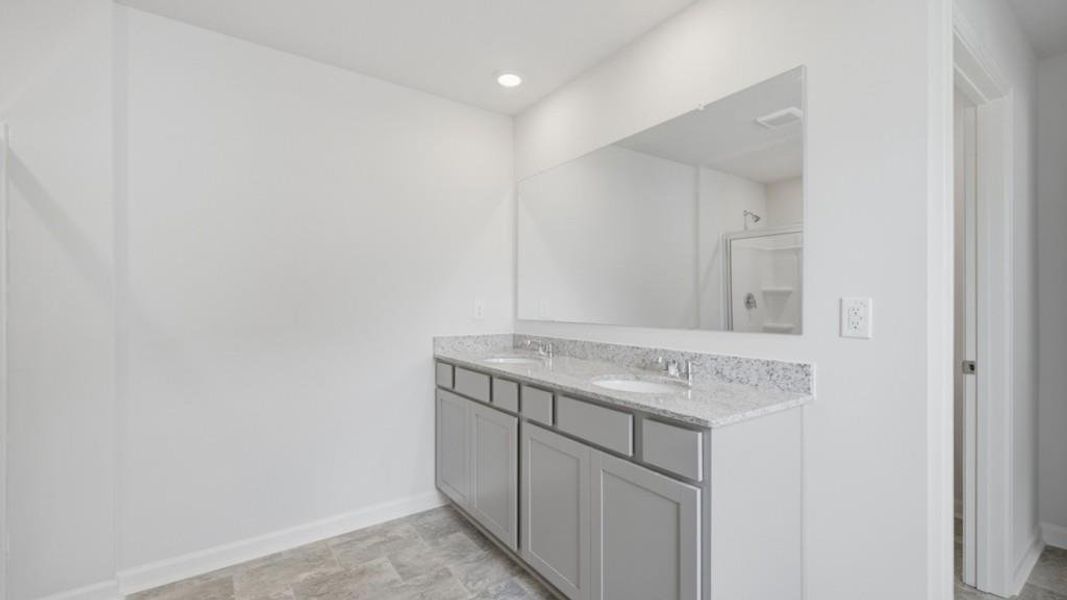 Furnished interior view inside a new home in Oaks at Cedar Grove, Fairburn (Image 10).